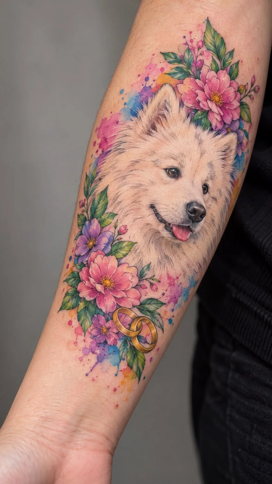 Watercolor dog portrait with flowers tattoo on the forearm